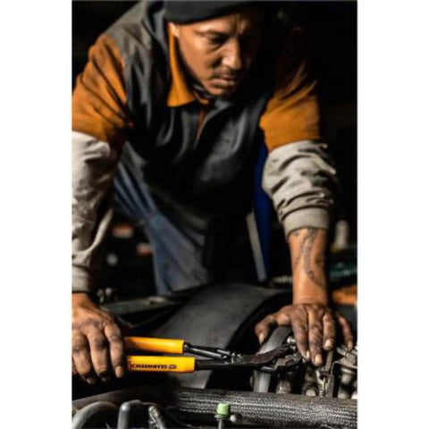 Man using Six Piece Dipped Mixed Material Pliers Set With High Leverage Joint For Pro Grade Thirty Five Percent More Cutting Power