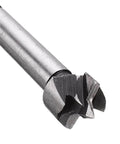 Woodworking drill bit; close-up of a silver steel bit with a multi-flute cutting head.