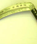 23 Inch Long Handle Tropical Vine Grass Sickle For Pruning Cutting And Harvesting Lightweight Yet Durable With Sturdy Wooden Handle And Heavy Gauge Stainless Steel Blade Serrated Edge Ideal For Weeds And Grass, showing engraved blade details.