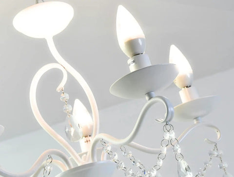 Close-up of French Country Crystal Pendant Light with White K9 Crystals and Wrought Iron Frame showing E12 candle bulbs.