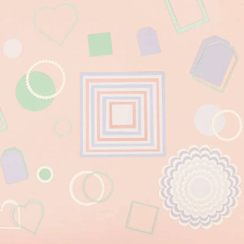 Assorted die shapes including scalloped circles, squares, and hearts, from Mini Die Set For Scrapbooking And Card Making - 7 Scalloped Circle Dies