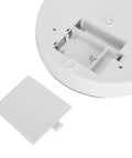 Detail of the bottom of Smooth Rotating Display Stand With Electric Turntable For Jewelry Watches Phones And Bags, featuring battery compartment.
