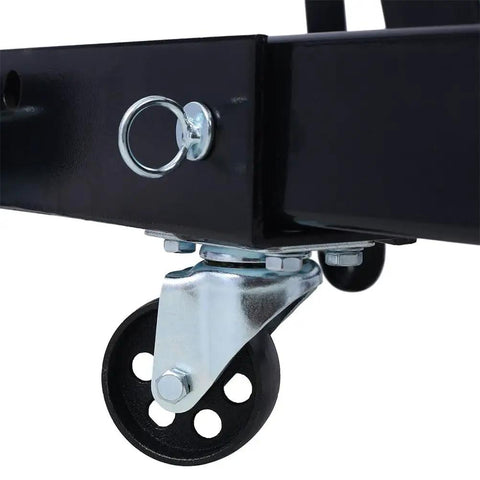 Close-up of the rugged caster wheel of the Hardcore 2 Ton Hydraulic Engine Hoist Cherry Picker Shop Crane.