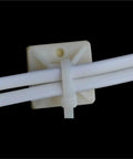 250 Pcs Peel And Stick Cable Tie Mount Bases For Heavy Duty Wire Wrangling Transform Your Home Or Office Setup With Rock Solid Plastic Holders That Grab Tight And Keep Everything Looking Clean 40Mm close-up of white cables secured on a plastic adhesive mount