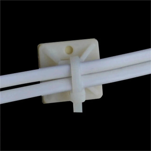 250 Pcs Peel And Stick Cable Tie Mount Bases For Heavy Duty Wire Wrangling Transform Your Home Or Office Setup With Rock Solid Plastic Holders That Grab Tight And Keep Everything Looking Clean 40Mm close-up of white cables secured on a plastic adhesive mount