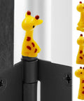 Mini Giraffe Door Hinge Heads Set Of 3 Magnetic Door Decor Toppers for metal surfaces in quirky cottage style on door hinge.