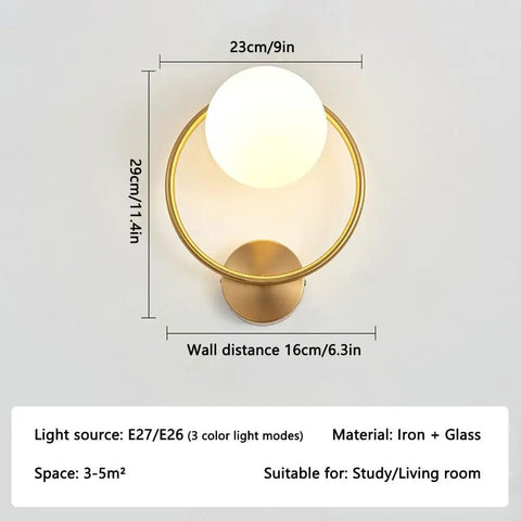 Modern Luxury Sphel Glass lampshade Wall Sconce 9.0 Inch Width den Iron Body Wall Lamp with 3 Color Mode Indoor Lighting Fixture for Bedroom Living Room Study Hallway, showing gold circular design and frosted glass.