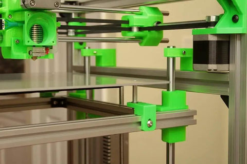 Built Tough Hypercube Evolution 3D Printer Metal Frame Kit close-up of green extrusion components and assembly details.