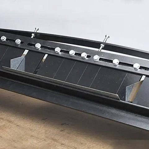 Close-up of MB48B 48 Inch Pan Style Mini Brake in use, showing bending mechanism for 22 gauge galvanized steel on a bench.