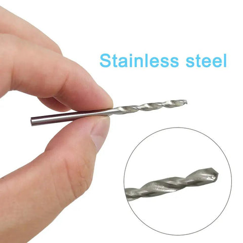 Hand holding a 0.8mm stainless steel drill bit from Rock Solid Aluminum Hand Pin Vise Kit Hella Tough.