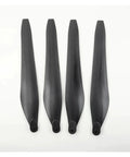 Carbon Fiber 3411 Propellers For Drones, CW CCW Matched Pair, Foldable Blades displayed in a row