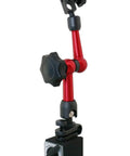 Dial indicator with red adjustable arm and magnetic base.