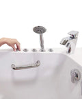 Sleek 32X52 Acrylic Transfer Walk In Tub With Heavy Duty Hydro Massage And Microbubble Jets control panel and faucet close-up.