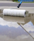 Roller applying Top Shelf Penetrating Concrete Sealer For Driveways And Patio Slabs on a smooth surface.