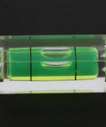 Ycauty 5PCS Small Bubble Level 15*15*40MM Mini Square Spirit Level Picture showing clear acrylic level with green liquid.