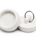 Heavy Duty Rubber Drain Plug With Hanging Ring Shuts Nasty Smells Dead Fits Like A Glove On One Point Five To One Point Six Inch Pipes Kills Clogs Fast Works Like A Charm For Kitchen And Bath Setups Two Pack White - Two white rubber drain plugs with hanging ring.