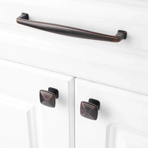 Ten Pack Oil Rubbed Bronze Cabinet Knobs Set For Cabinets And Drawers Square Single Hole Pulls For Dresser Cupboard Bedroom Closet And Bathroom Vanity Made From Solid Metal For Durable Easy Install Hardware The Best Bang For Your Buck shown on white cabinet doors.