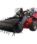 Stomp Mini Skid Steer Loader With 1800 Lb Capacity and Lawn Scarifier Attachment in operation