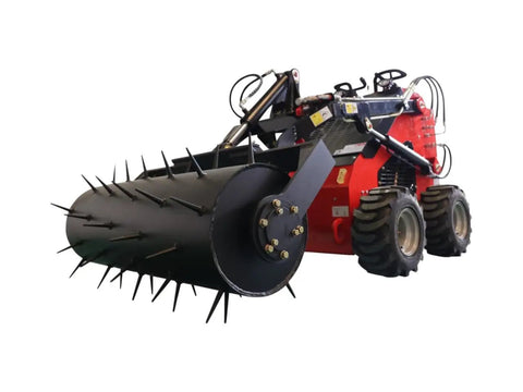 Stomp Mini Skid Steer Loader With 1800 Lb Capacity and Lawn Scarifier Attachment in operation