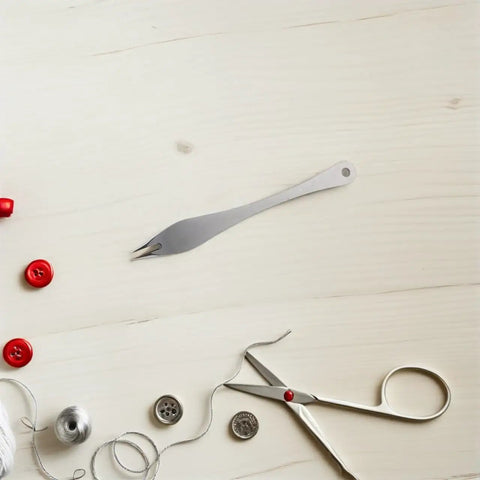 Straight Up Precision Leather Marking Divider And Adjustable Stainless Steel Wing Creaser on a wooden table with sewing tools.