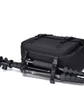 SLR Camera Bag For Single Shoulder Use with tripod attached, durable nylon design, large zippers for quick access, shown from side.