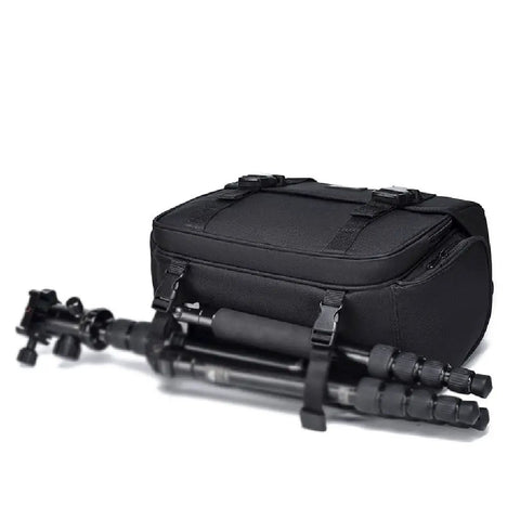 SLR Camera Bag For Single Shoulder Use with tripod attached, durable nylon design, large zippers for quick access, shown from side.