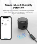 Smart IR Hub With Sensor Cable, WiFi Infrared Blaster for TV, AC, projector next to smartphone displaying temperature and humidity
