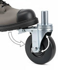 Tough As Nails 5 Inch Caster Wheels 4 Pack With Dual Locking Brakes demonstrated with a work boot on the wheel.