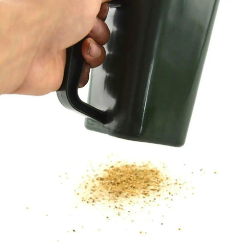 Green Plastic Garden Shovel All In One Plant Scoop in hand sifting soil, showing functionality for transplanting and potting soil.