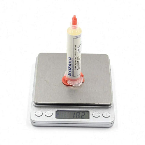 559 UV Flux Paste Lead-Free Solder Paste 10cc NC-559-ASM-UV with Needles on Digital Scale, High-Performance Flux for SMT Rework.