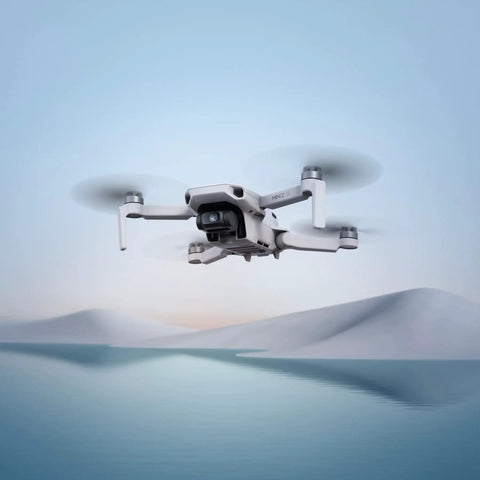 Ultra Lightweight Mini Drone With QHD Video, 10km Transmission, 31 Minute Flight Time, Under 249 Grams, Auto Return Home flying over water