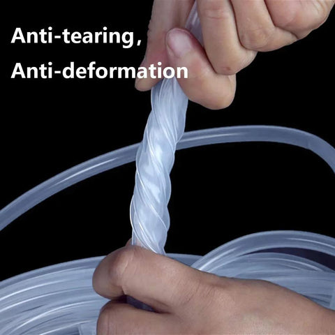 Clear silicone tubing, 1/4 inch ID, twisted by hands in close-up; flexible, food-grade hose