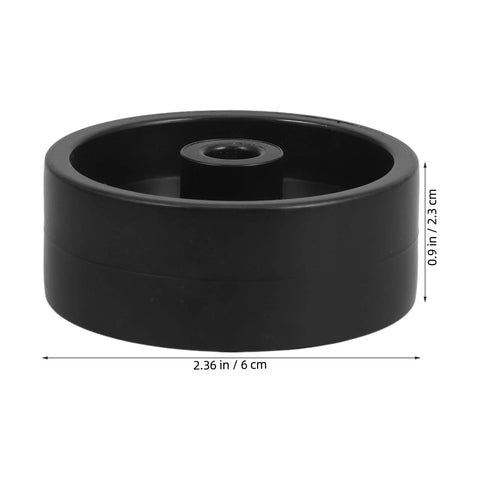 Front view of black plastic patio heater caster wheel with central bore, 6 cm diameter.