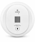 Rock Solid Compact Battery Powered Smoke Detector Featuring Rapid Photoelectric Sensor And Matte Black Casing For No Sweat Home Protection With Quick Wall Install And Extended Battery Runtime For Serious Fire Defense, front view