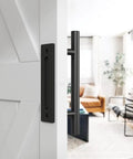 Two Pack Sliding Barn Door Handle Set, 12 Inch Heavy Duty Pull And Flush Hardware, Black Rustic Round Two Sided Design installed on door