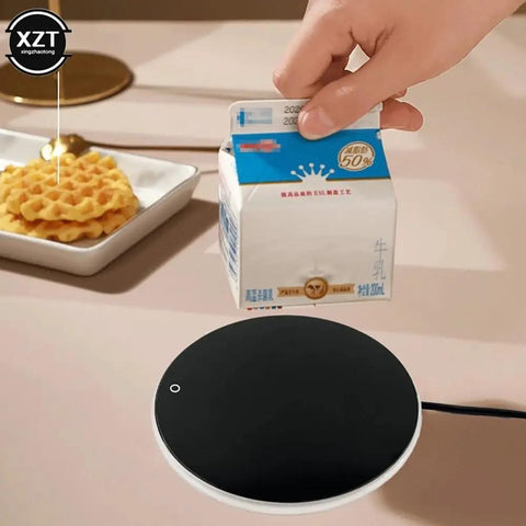 Portable Cup Warmer And Coffee Mug Heater With Smart Thermostatic Control To Keep Your Daily Brew Piping Hot On Any Desk, lightweight plastic, with milk carton and waffles.