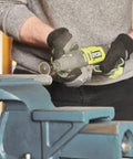 User handling the Smooth Operator 12 Volt Cordless Rotary Tool Featuring Variable Speed Up To 35000 RPM for precision work.