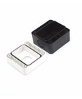 Angled view of two-piece plastic button box enclosure; black lid, white base with gasket