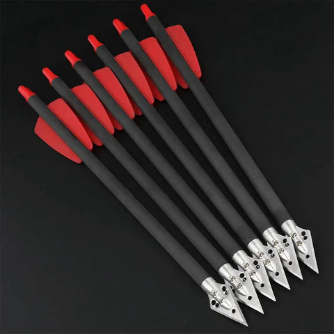 Set of eight inch carbon crossbow bolts with red vanes and steel broadhead tips for hunting and target practice