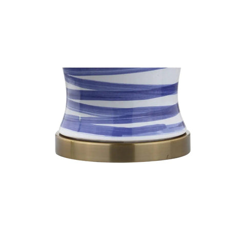 Close-up of blue and white ceramic base of the 29 inch tall table lamp with coastal vibe and linen shade.