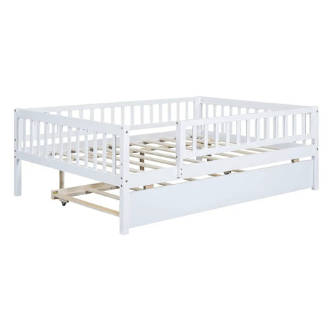 Full-Size Wood Daybed With Trundle And Fence Guardrails In White Finish showing rollout trundle and fence rails