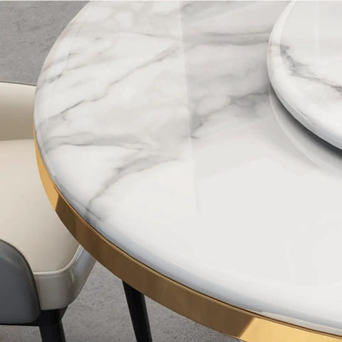 Close-up of Kickback Ready Round Marble Dining Table Built For Epic Weekend Hangouts Featuring A Smooth White Spinning Lazy Susan.