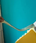 Low Tack Masking Tape for Delicate Surfaces, 2 Rolls, 1 Inch By 55 Yards being peeled from a painted wall edge showing clean lines