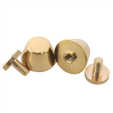 Straight Up Solid Brass Purse Feet With Flat Head Studs And Badass Screw Rivets For Pro Handbag Gear and Top Shelf Leather Crafting DIY Tools. Three brass purse feet with flat heads and screws.