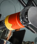 Eshok Guard Half Inch Socket Isolator for Impact Wrenches and Socket Sets in use with metal tool, close-up view.