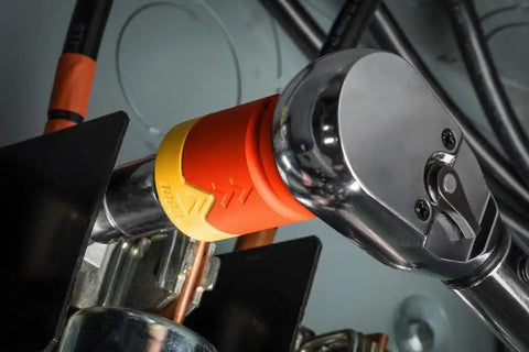 Eshok Guard Half Inch Socket Isolator for Impact Wrenches and Socket Sets in use with metal tool, close-up view.