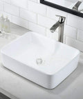White Vessel Sink With Faucet And Drain Combo For A Dope Modern Bath 19x15 Rectangle Vessel Sink Above Counter Top Mount Porcelain Ceramic Bathroom Basin Durable Easy Clean Design with running water in a sleek bathroom.