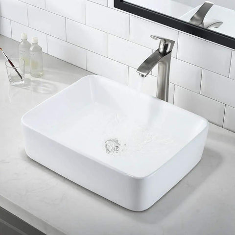 White Vessel Sink With Faucet And Drain Combo For A Dope Modern Bath 19x15 Rectangle Vessel Sink Above Counter Top Mount Porcelain Ceramic Bathroom Basin Durable Easy Clean Design with running water in a sleek bathroom.