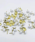 Hella Sturdy White Upholstery Tacks And Decorative Thumbtacks For Sofa Headboards And Furniture Trim with round white heads.