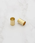 Two brass pot sleeves for guitar split-shaft pots, 6.35 mm OD, 6.04 mm ID